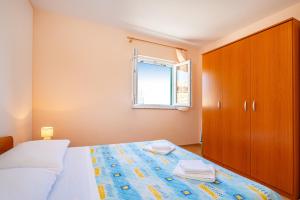 Seaside apartments with a swimming pool Posedarje, Novigrad - 6162