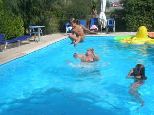 Family friendly apartments with a swimming pool Seget Vranjica Trogir 7559