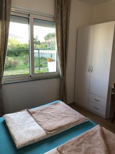 Apartments with parking space Rab - 12383