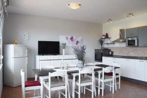 Apartments with parking space Rab - 12383