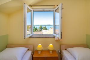 Seaside apartments with a swimming pool Posedarje, Novigrad - 6162