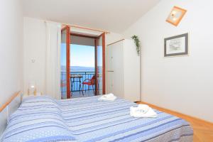 Apartments by the sea Mimice, Omis - 7522