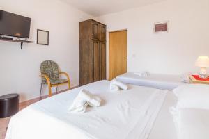 Apartments with parking spaces Arbanija, Ciovo - 7543