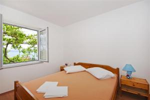 Apartments by the sea Dugi Rat, Omis - 7575