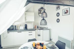 Appartements Le loft superbe studio avec stationnement gratuit : photos des chambres