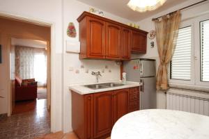 Apartments with a parking space Icici, Opatija - 7822
