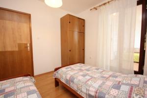 Apartments with a parking space Mali Losinj (Losinj) - 7944