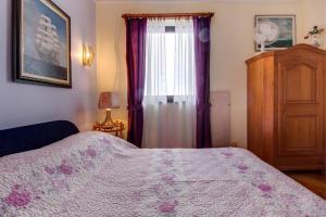 Apartments with a parking space Mali Losinj (Losinj) - 8000