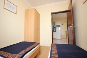 Apartments with a parking space Mali Losinj (Losinj) - 7939