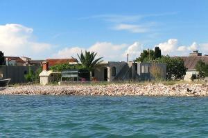 Apartments by the sea Krapanj, Sibenik - 9258 