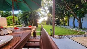 Océanos - Sunset, BBQ, Beach & Kayak - オケアノス