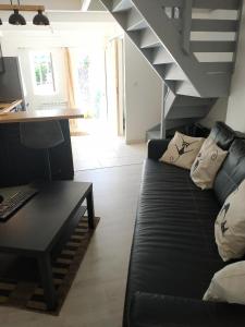 Maisons de vacances Nid sous le volcan - Maison avec jardins : photos des chambres