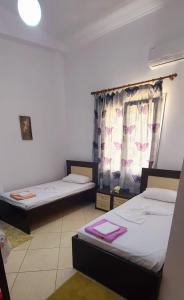 Twin Room with City View room in Hotel Shpetimi