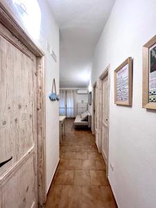 DOMUS HENRICUS -THREEROOM APARTMENT IN PORTO POLLO 400 Meters from the sea