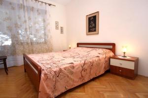 Two-Bedroom Apartment with Terrace and Sea View room in Apartment Arbanija 9423a