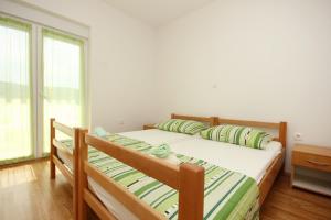 One-Bedroom Apartment with Terrace and Sea View room in Apartments with a parking space Poljica Trogir - 10010