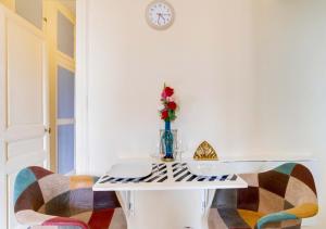 Appartements Au PIED de la GARE aux PORTES de PARIS : photos des chambres