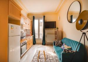 Appartements Au PIED de la GARE aux PORTES de PARIS : photos des chambres