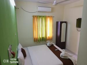 Green Tree Hotel-Near VFS Global and Ramee Mall