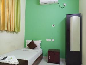 Green Tree Hotel-Near VFS Global and Ramee Mall