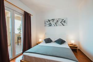 Two-Bedroom Apartment with Terrace and Sea View room in Apartments by the sea Mastrinka Ciovo - 11711