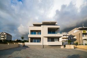 Apartments with a parking space Novalja, Pag - 11775 