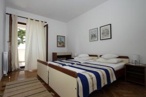 Two-Bedroom Apartment with Terrace and Sea View room in Apartments by the sea Trogir - 11895