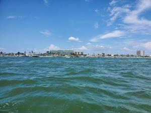 Beach Style lake view home with boat parking & minutes to the best beaches!