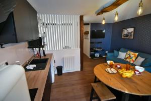 Appartements Au Fil du Temps : photos des chambres