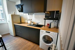 Appartements Au Fil du Temps : photos des chambres