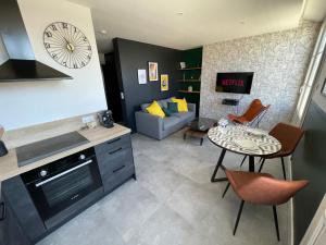 Appartements Zosca YourHostHelper : photos des chambres