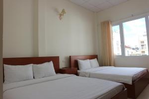 Phòng Deluxe Giường Đôi/2 Giường Đơn (Deluxe Double or Twin Room)