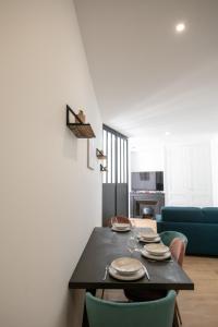 Appartements L'Arty - Tres joli studio moderne place Valmy : photos des chambres