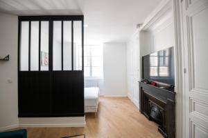 Appartements L'Arty - Tres joli studio moderne place Valmy : photos des chambres