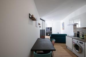 Appartements L'Arty - Tres joli studio moderne place Valmy : photos des chambres