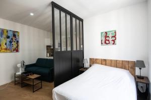 Appartements L'Arty - Tres joli studio moderne place Valmy : photos des chambres