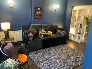 Appartements Le Duplex du Beffroi : photos des chambres