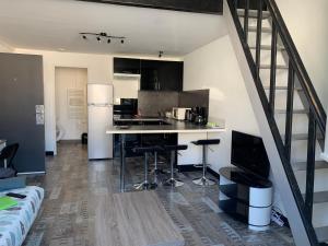 Appartements Appartement T2 tout confort en mezzanine a 15mn a pied du centre-ville avec TV et Wifi : photos des chambres