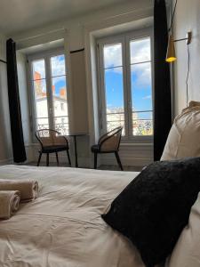 Appartements Suite Athos : photos des chambres