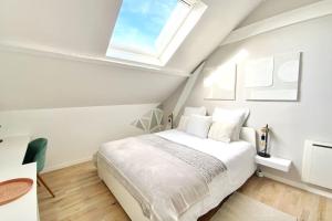 Appartements chaleureux - 15 min a pied de la gare : photos des chambres