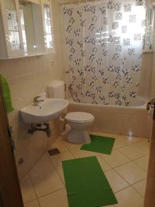 Apartments with a parking space Podgora Makarska 12306