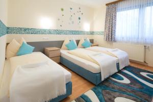 Triple Room room in Hotel Zlami-Holzer