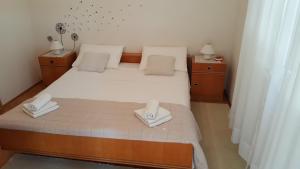 Apartments by the sea Posedarje, Novigrad - 12402