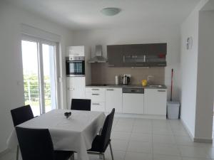 Apartments with a parking space Novi Vinodolski 12498