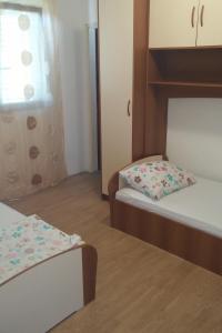 Apartments by the sea Lopar, Rab - 12534