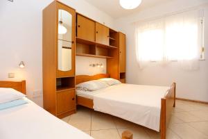 One-Bedroom Apartment with Terrace room in Apartments by the sea Seget Vranjica Trogir - 12760