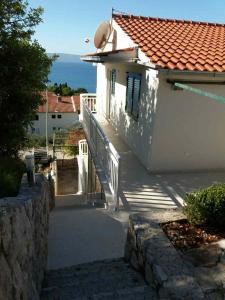 Apartments with a parking space Podgora, Makarska - 12807 
