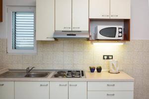 Apartments by the sea Rogoznica - 12820