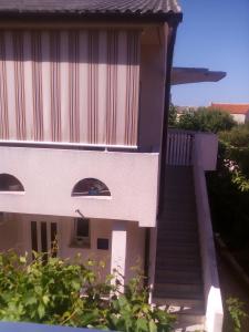 Apartments with a parking space Novalja, Pag - 13497 