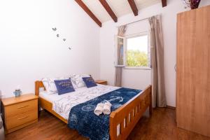 Family friendly house with a swimming pool Cove Triluke, Pasman - 13577